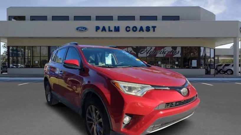 TOYOTA RAV4 2016 JTMYFREV9GJ062821 image