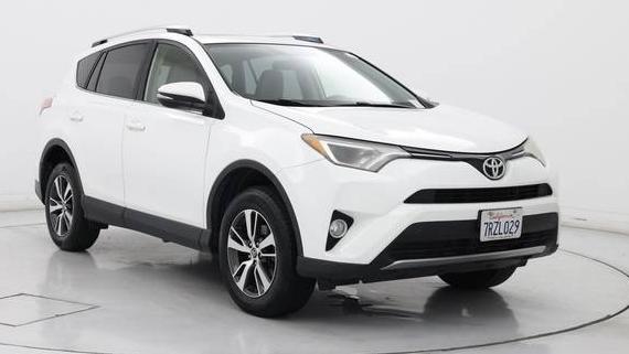 TOYOTA RAV4 2016 JTMWFREV8GJ079116 image