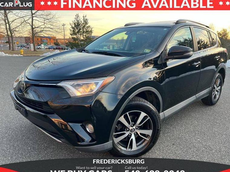 TOYOTA RAV4 2018 2T3RFREV6JW852087 image