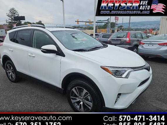 TOYOTA RAV4 2018 JTMRFREV6JD236306 image