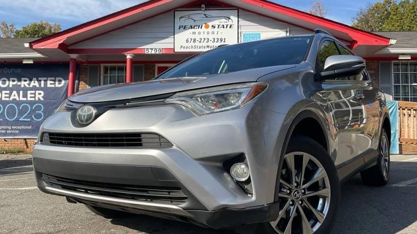 TOYOTA RAV4 2018 JTMYFREV9JJ184277 image