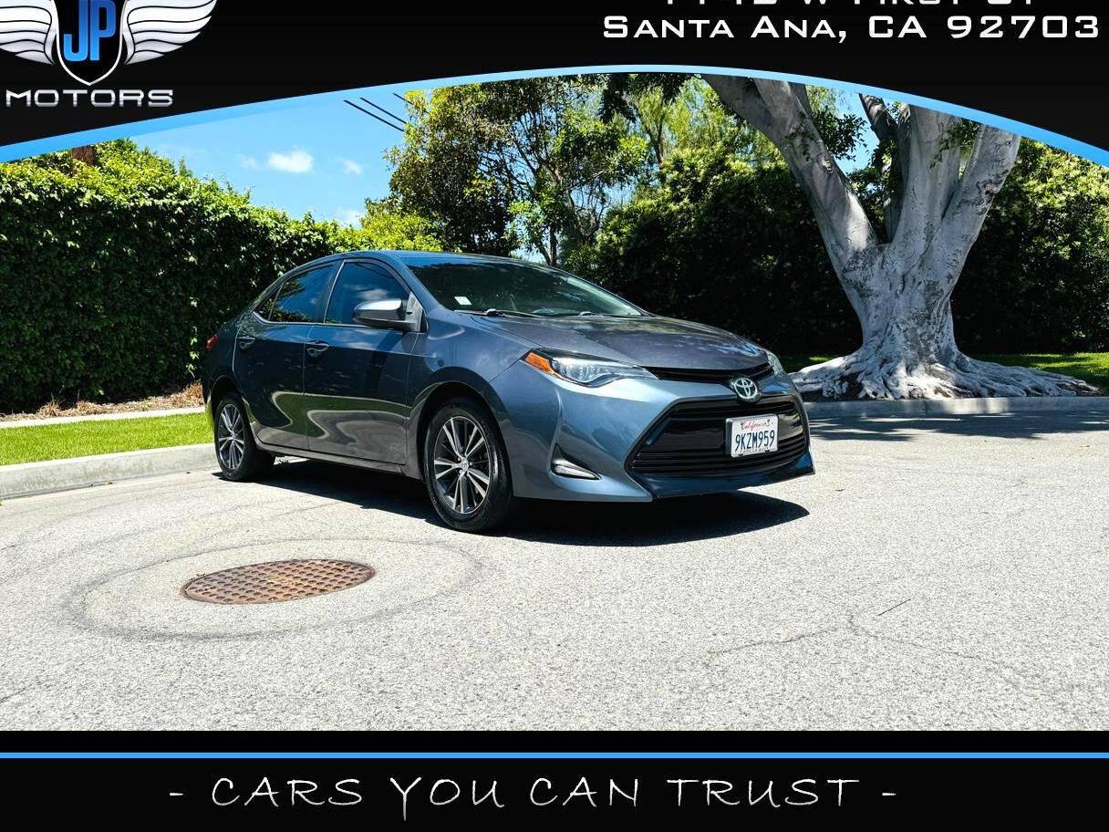 TOYOTA COROLLA 2018 5YFBURHE9JP784414 image
