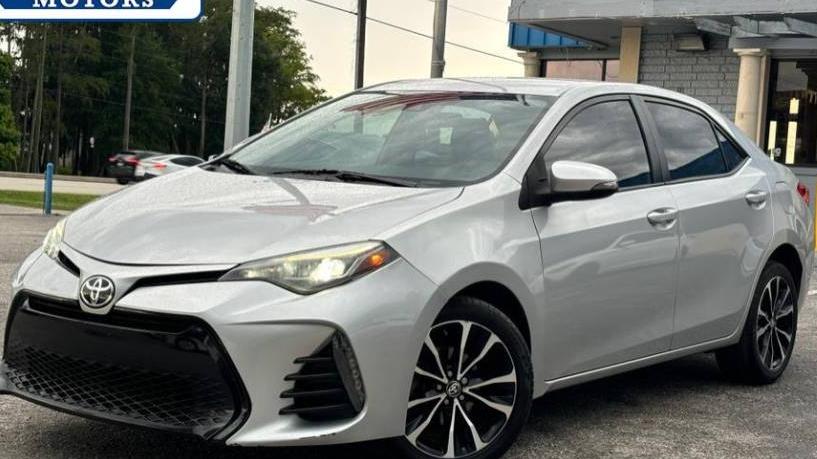 TOYOTA COROLLA 2018 5YFBURHE9JP768276 image