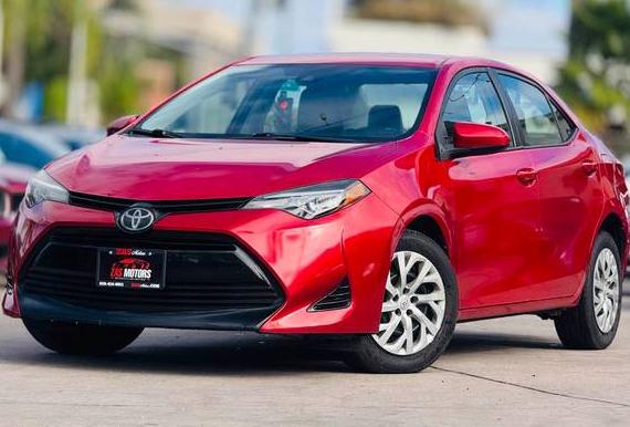 TOYOTA COROLLA 2018 2T1BURHE3JC014161 image