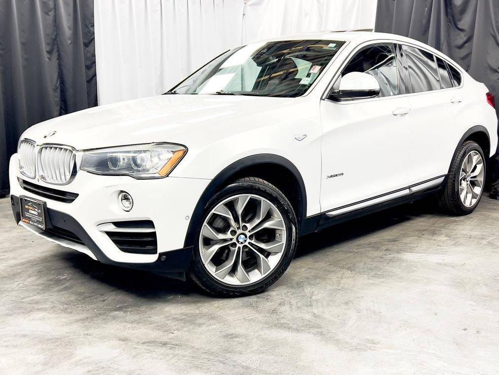 BMW X4 2018 5UXXW3C5XJ0Z60657 image