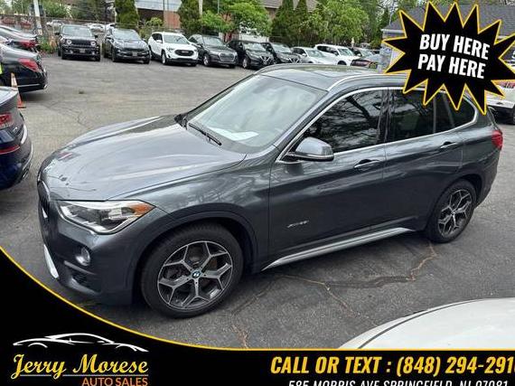 BMW X1 2016 WBXHT3C32GP886201 image