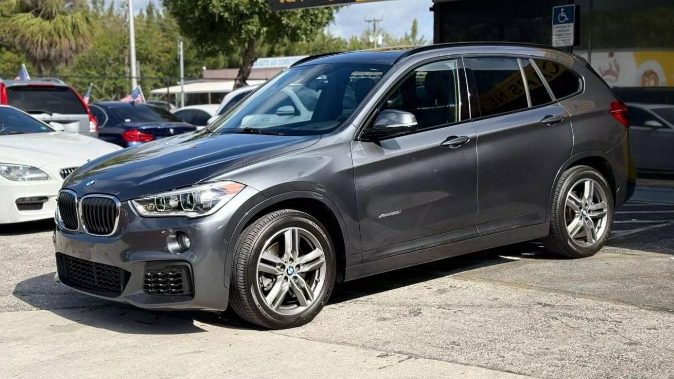 BMW X1 2016 WBXHT3C3XG5E54115 image