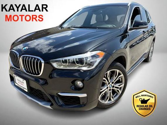 BMW X1 2016 WBXHT3Z33G4A48402 image