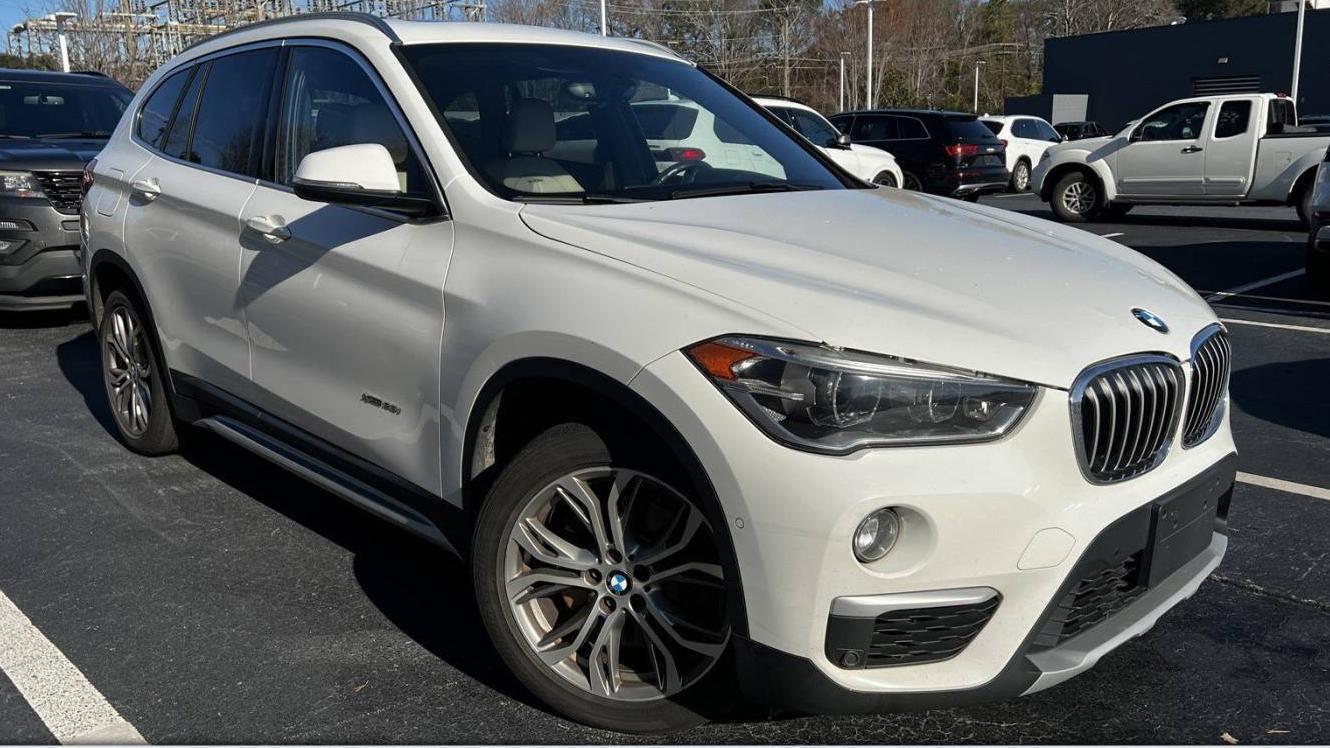 BMW X1 2016 WBXHT3Z30G4A48860 image