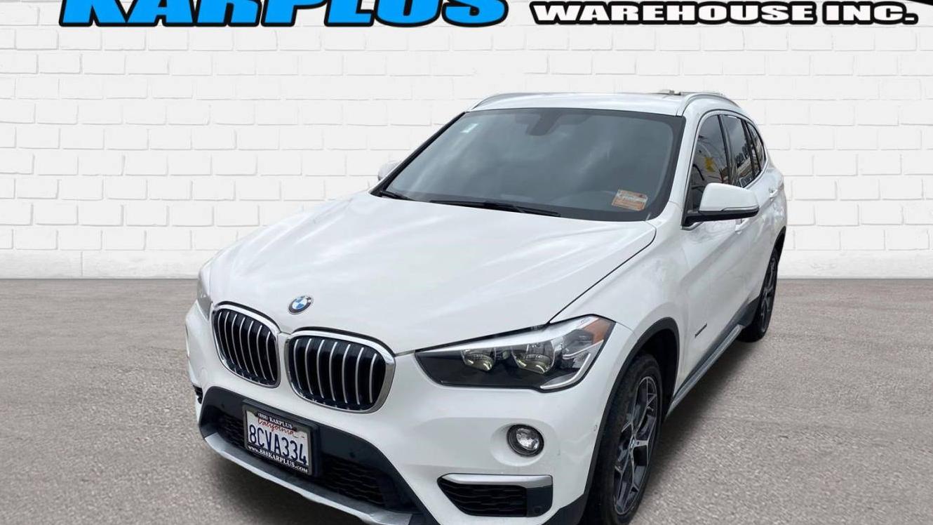 BMW X1 2018 WBXHT3C38J5K28160 image