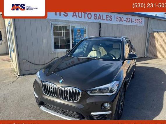 BMW X1 2018 WBXHT3C36J5L26281 image