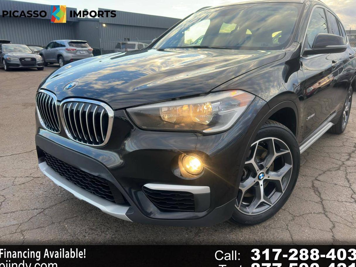 BMW X1 2018 WBXHT3C35J5F89204 image