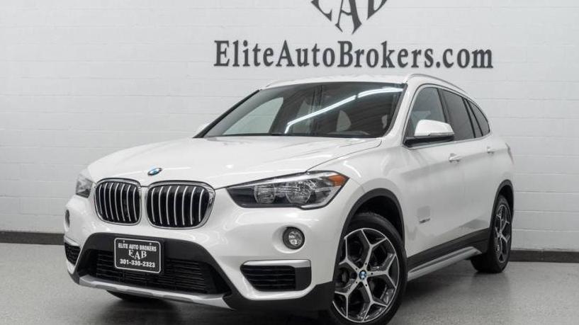 BMW X1 2018 WBXHT3C33J5K30396 image