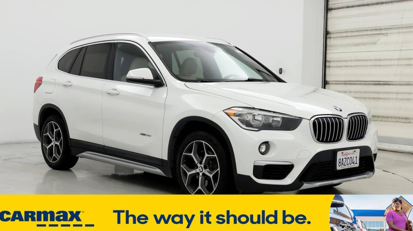 BMW X1 2018 WBXHT3C33J5F89332 image