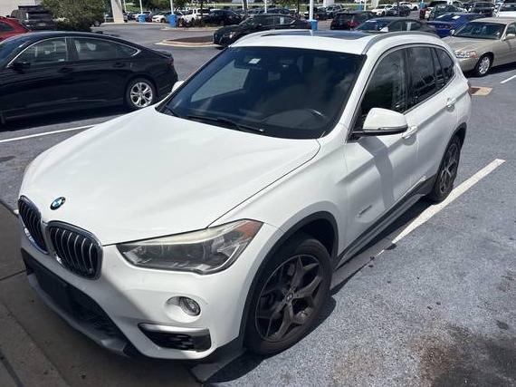 BMW X1 2018 WBXHT3C38J5F92744 image