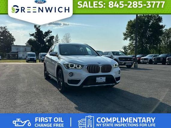 BMW X1 2018 WBXHT3C38J3H30889 image