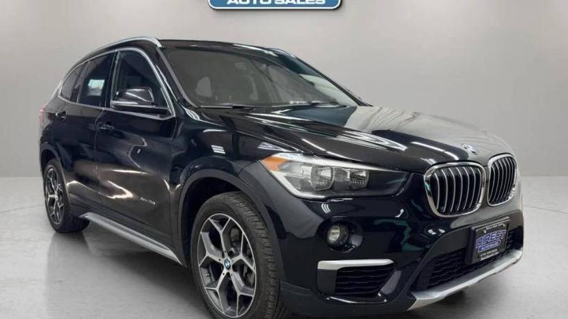 BMW X1 2018 WBXHT3C38J5F89682 image