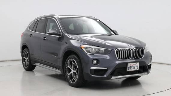 BMW X1 2018 WBXHT3C3XJ5F89764 image