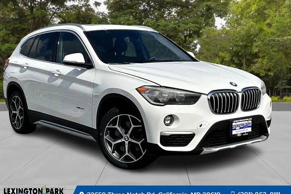 BMW X1 2018 WBXHT3C3XJ5F89506 image