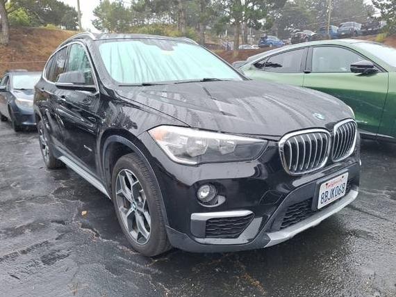 BMW X1 2018 WBXHT3C32J5F90939 image