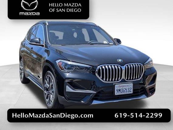 BMW X1 2021 WBXJG7C02M5U16048 image
