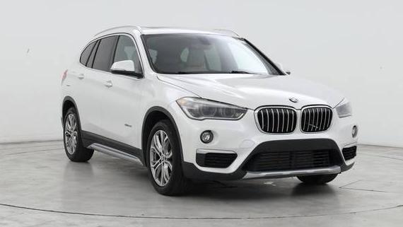 BMW X1 2017 WBXHT3C30H5F77004 image