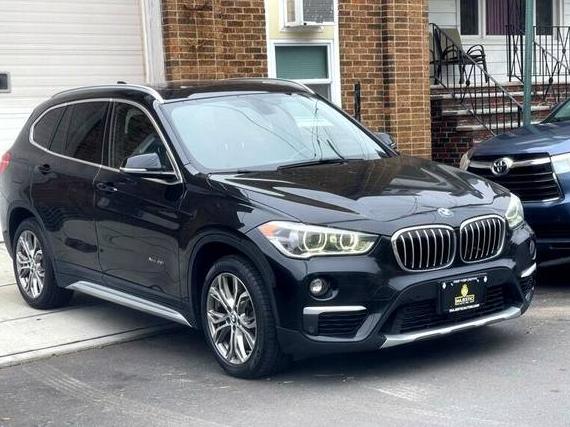 BMW X1 2017 WBXHT3Z32H4A65659 image