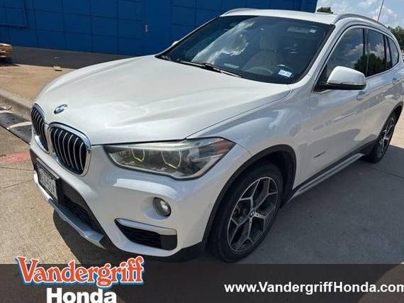 BMW X1 2017 WBXHT3C31H5F70918 image
