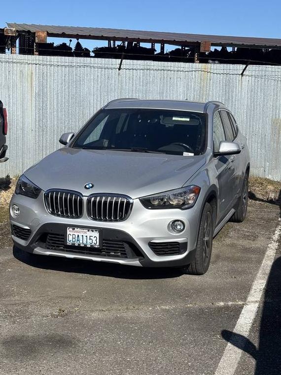 BMW X1 2017 WBXHT3C36H5F68565 image