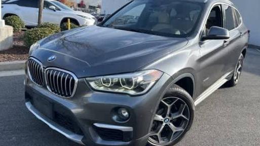 BMW X1 2017 WBXHT3Z39H4A56456 image