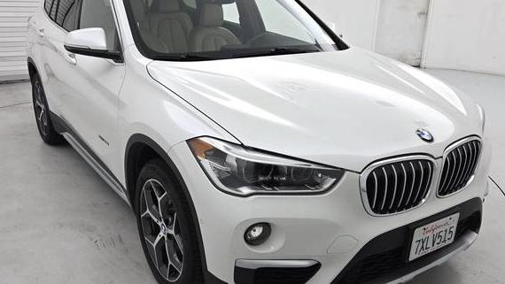 BMW X1 2017 WBXHT3C36H5F78867 image